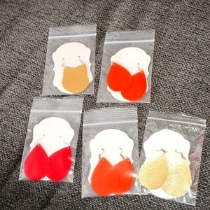 5- homemade cutout teardrop light weight dangle earrings of leather type materia